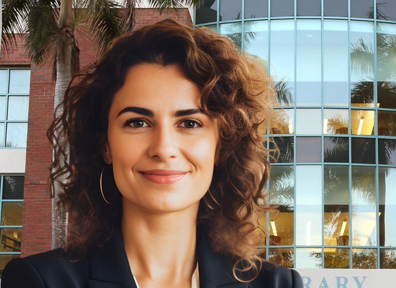 Business Professional in front of Broward College Central Campus Library