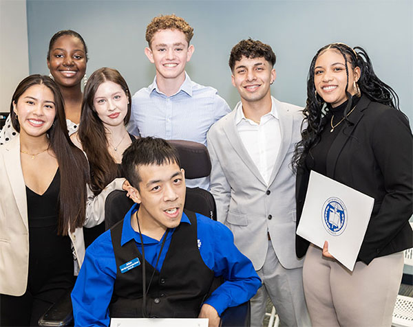 Seven Student Government Members Posing for a Group Photo